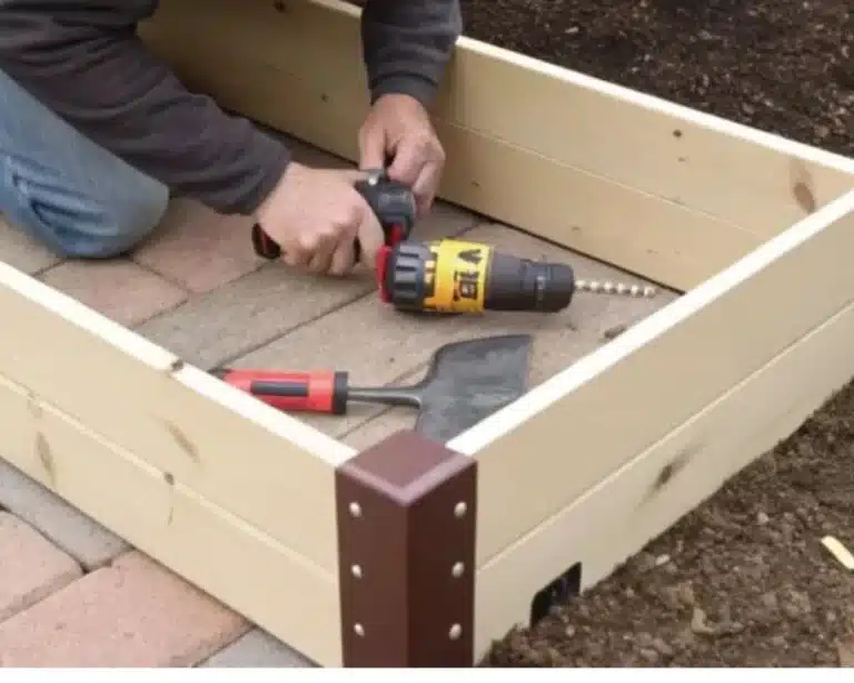 Wooden raised bed corners with plants growing in a well-maintained garden