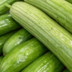 Close-up view of Armenian cucumbers showing their smooth texture and elongated shape.